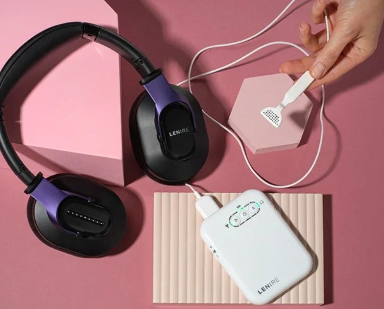 The Lenire device: wireless headphones, the Tonguetip and the controller